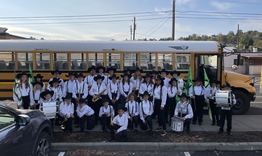 band students beside the bus